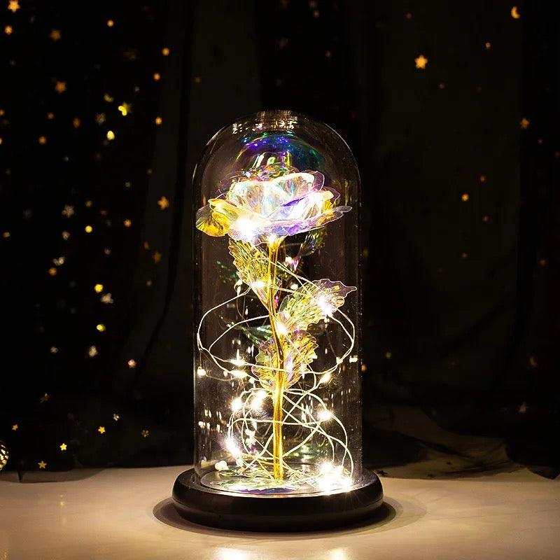 Everlasting white galaxy rose in a glass dome with warm LED lights, a timeless and romantic gift for Valentine’s Day, anniversaries, and special occasions.