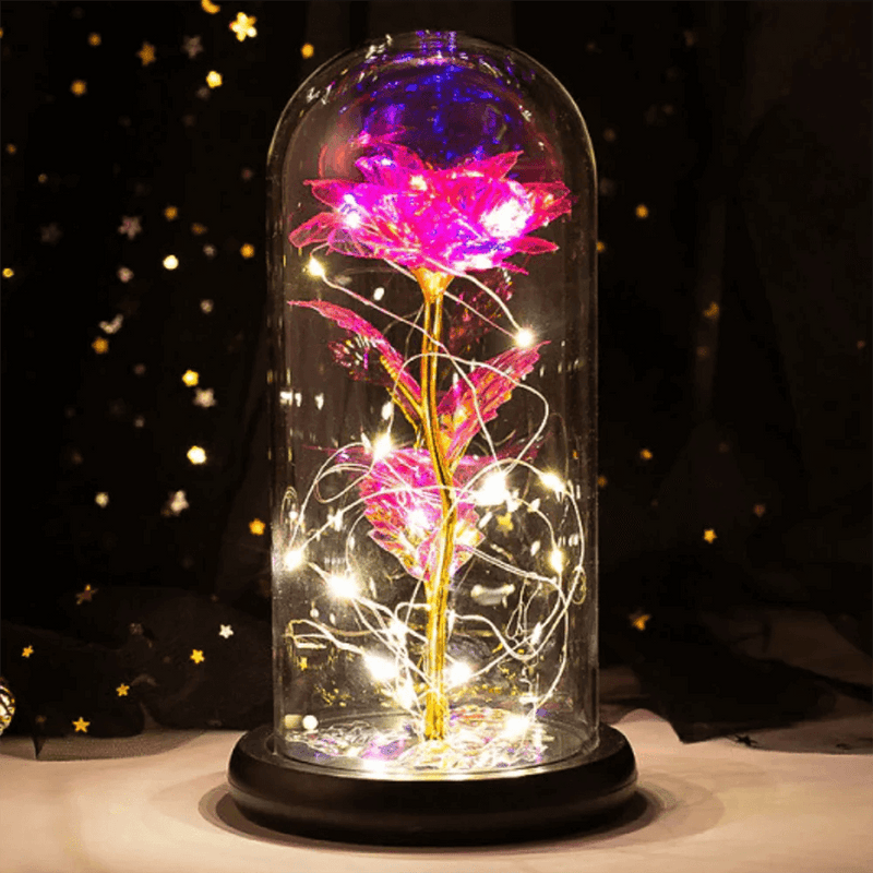 Pink galaxy rose in a glass dome with LED fairy lights, a perfect luxury gift for birthdays, anniversaries, and romantic occasions.