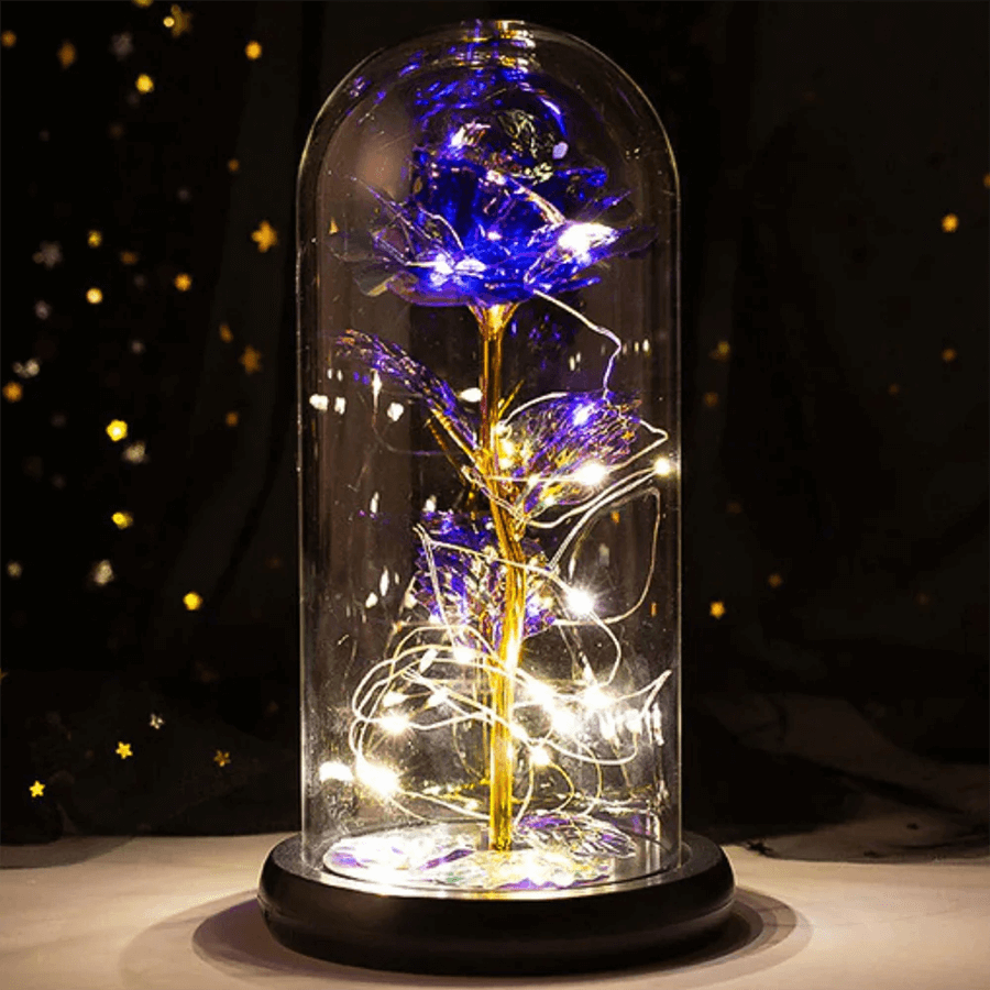 Enchanted galaxy rose in deep purple with glowing LED lights, encased in a glass dome with a black base, an elegant gift for special occasions such as birthdays and anniversaries.