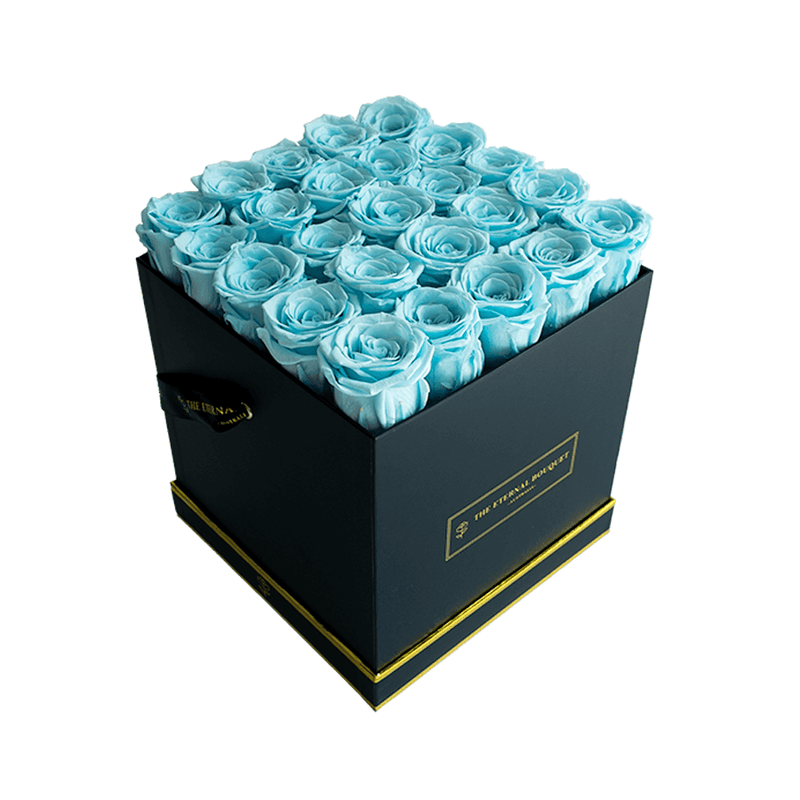 Everlasting light blue roses in a black square box 