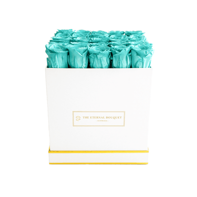 Long Lasting Tiffany Blue roses in a white rose bouquet box front view