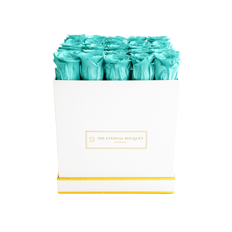Long Lasting Tiffany Blue roses in a white rose bouquet box front view