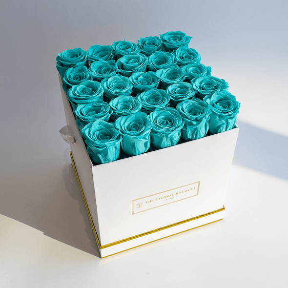 Long Lasting Tiffany Blue roses in a white rose bouquet box top view