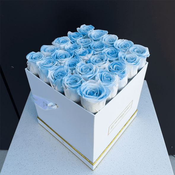 Everlasting Gradient Blue Roses in a white bouquet rose box - side view
