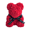 A handcrafted everlasting red rose teddy bear from The Eternal Bouquet, adorned with a sleek black ribbon featuring the brand’s logo. This luxurious and timeless gift makes a bold romantic statement, perfect for anniversaries, Valentine’s Day, or simply to show someone how deeply they’re loved.
