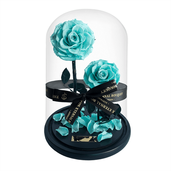 Two Everlasting Tiffany Blue Roses in a glass dome