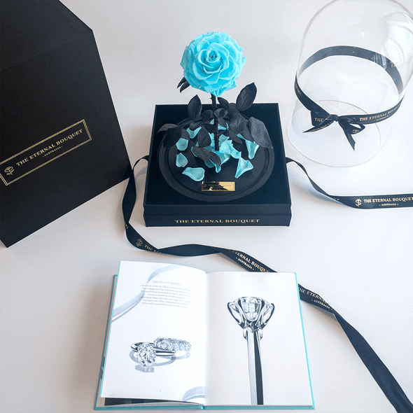 Tiffany Blue Everlasting Rose in a Glass Dome with a satin black gift box and a Tiffany & Co booklet